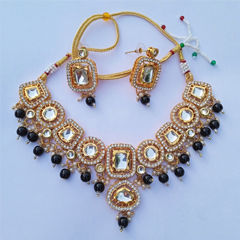 Gold Rodium Polish Black and Grey color Necklace in Metal Alloy studded with Kundan