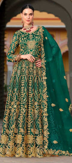 Green color Salwar Kameez in Net fabric with Stone work