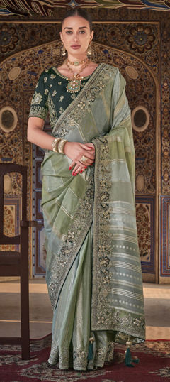 Green color Saree in Silk fabric with Stone work