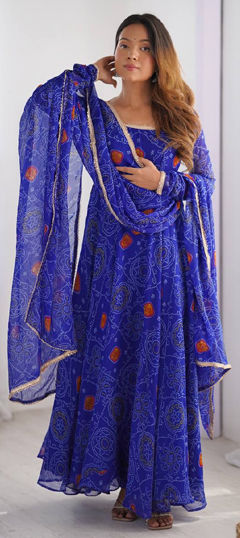 Blue color Salwar Kameez in Chiffon fabric with Bandhej, Printed work