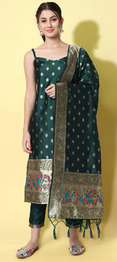 Green color Salwar Kameez in Silk cotton fabric with Weaving work