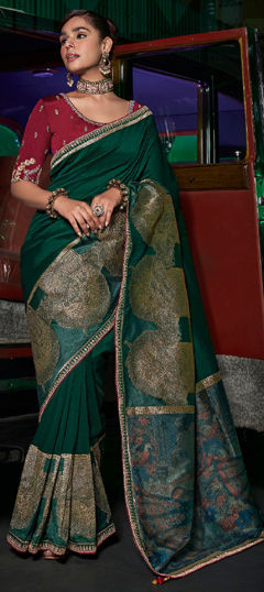 Green color Saree in Silk fabric with Sequence, Weaving, Zari work