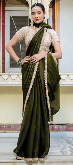 Green color Saree in Semi Velvet fabric with Bugle Beads, Cut Dana, Thread work