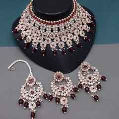Gold Rodium Polish Red and Maroon color Necklace in Metal Alloy studded with CZ Diamond, Kundan, Pearl