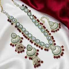 Gold Rodium Polish Red and Maroon color Necklace in Metal Alloy studded with CZ Diamond, Kundan, Pearl