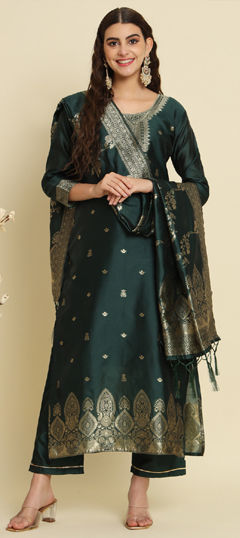 Green color Salwar Kameez in Silk cotton fabric with Weaving work