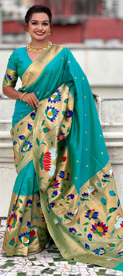 Green color Saree in Silk fabric with Weaving work