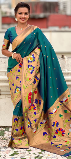 Green color Saree in Silk fabric with Weaving work