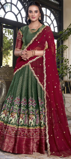 Green, Red and Maroon color Lehenga in Kanjeevaram Silk fabric with Weaving work