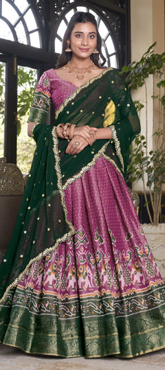 Green, Pink and Majenta color Lehenga in Kanjeevaram Silk fabric with Weaving work