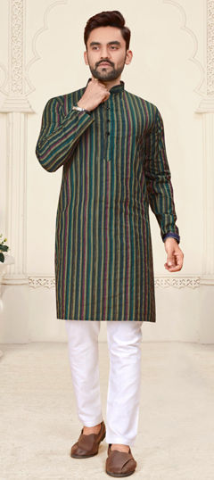 Green color Kurta Pyjamas in Cotton fabric with Weaving work