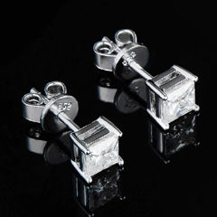 Silver Rodium Polish White and Off White color Earrings in Metal Alloy studded with Austrian diamond