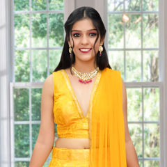 Yellow color Blouse in Brocade fabric with Lace work