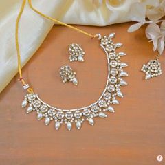 Gold Rodium Polish White and Off White color Necklace in Copper studded with CZ Diamond, Pearl