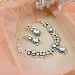Gold Rodium Polish White and Off White color Necklace in Copper studded with Kundan
