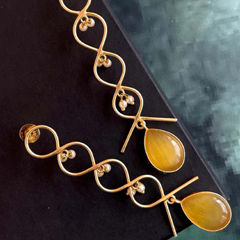Gold Rodium Polish Yellow color Earrings in Brass studded with CZ Diamond