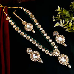 Gold Rodium Polish White and Off White color Necklace in Brass studded with Kundan
