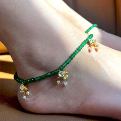 Gold Rodium Polish Green color Anklet in Brass studded with Kundan