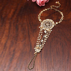 Gold Rodium Polish White and Off White color Haath Paan in Brass studded with Kundan