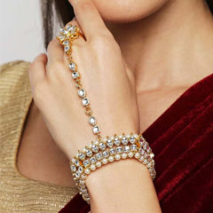 Gold Rodium Polish White and Off White color Bracelet in Brass studded with Kundan