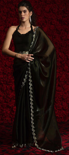 Green color Saree in Tissue fabric with Zircon work