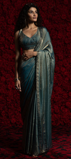 Blue color Saree in Tissue fabric with Zircon work