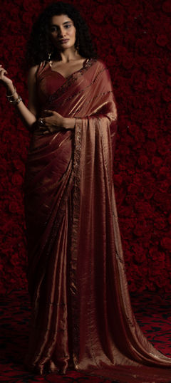 Pink and Majenta color Saree in Tissue fabric with Zircon work