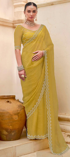 Yellow color Saree in Tissue fabric with Zircon work