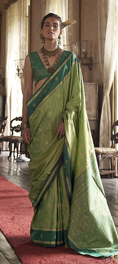 Green color Saree in Tussar Silk fabric with Weaving work