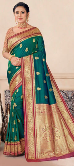 Green color Saree in Tissue fabric with Weaving, Zari work