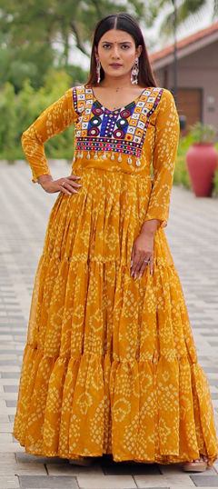 Yellow color Gown in Faux Georgette fabric with Bandhej, Embroidered, Mirror, Printed work