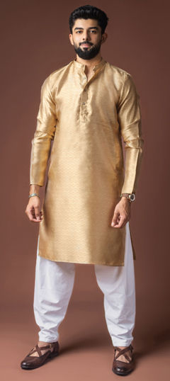 Gold color Kurta Pyjamas in Jacquard fabric with Weaving work