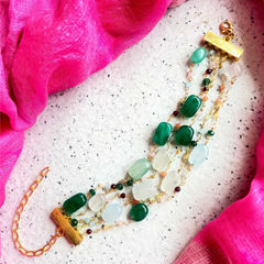 Gold Rodium Polish Green color Bracelet in Brass studded with CZ Diamond