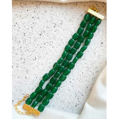Gold Rodium Polish Green color Bracelet in Brass studded with CZ Diamond