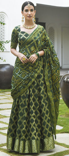 Green color Long Lehenga Choli in Banarasi Silk fabric with Floral, Gota Patti, Printed work