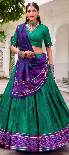Green color Lehenga in Tussar Silk fabric with Bandhej, Gota Patti, Printed work