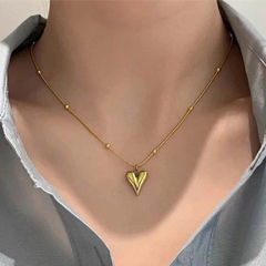 Gold Rodium Polish Gold color Pendant in Brass studded with Artificial