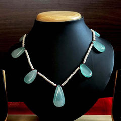 Gold Rodium Polish Blue color Necklace in Brass studded with Kundan