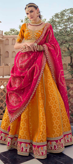 Orange color Lehenga in Tissue fabric with Border, Bugle Beads, Embroidered, Resham, Sequence, Stone, Weaving, Zari work