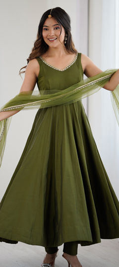 Green color Salwar Kameez in Roman Silk fabric with Lace work