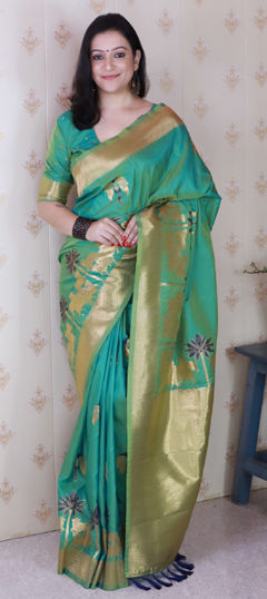 Green color Saree in Silk fabric with Weaving work