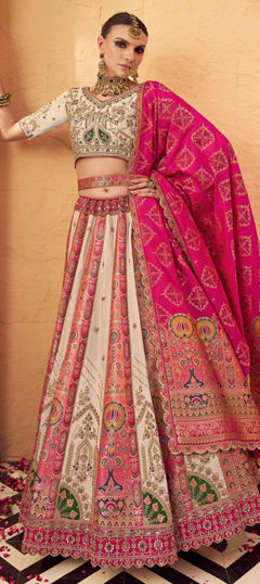 Pink and Majenta, White and Off White color Lehenga in Banarasi Silk fabric with Border, Embroidered, Resham, Stone, Weaving, Zari work