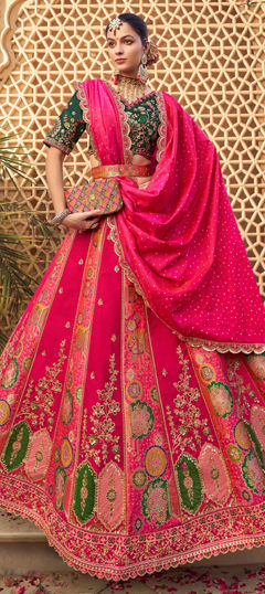 Pink and Majenta color Lehenga in Banarasi Silk fabric with Border, Embroidered, Resham, Stone, Weaving, Zari work