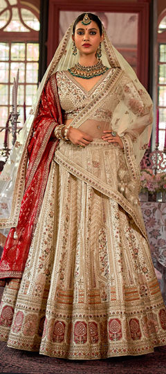 White and Off White color Lehenga in Silk fabric with Border, Embroidered, Moti, Sequence, Stone, Thread, Weaving, Zari work