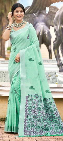 Green color Saree in Linen fabric with Weaving work