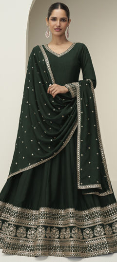 Green color Gown in Silk fabric with Embroidered work