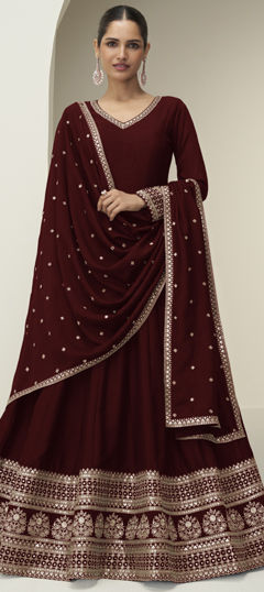 Red and Maroon color Gown in Silk fabric with Embroidered work
