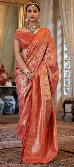 Orange color Saree in Tissue fabric with Weaving work
