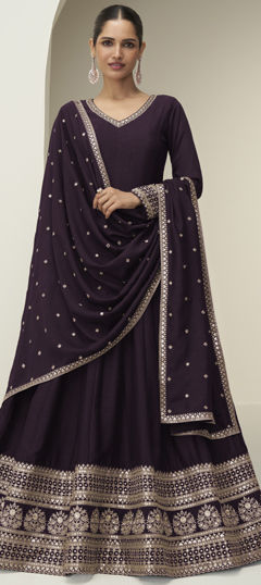 Purple and Violet color Gown in Silk fabric with Embroidered work