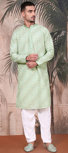 Green color Kurta Pyjamas in Cotton fabric with Sequence work